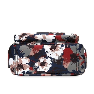 Floral print nylon crossbody bag with large flower patterns and spacious interior