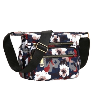Floral nylon crossbody bag with multi-zipper pockets and adjustable strap for women