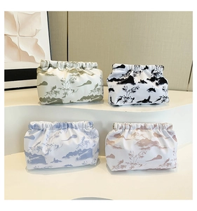 Set of four nylon landscape art pouches with elastic closures and traditional Chinese patterns