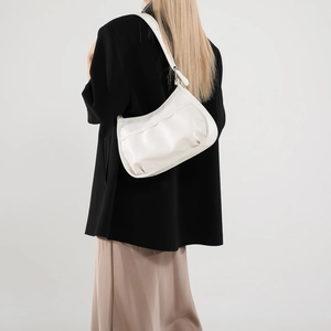 Minimalist white pleated crescent underarm bag for women with sleek shoulder strap style