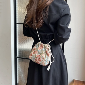 Ethnic style canvas bucket bag with floral embroidery and drawstring closure