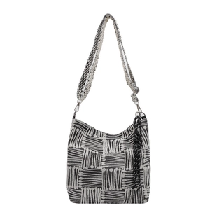 Large striped canvas crossbody bag with woven texture and decorative fringe tassels