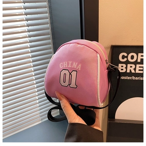 Close-up of pink mini sports shoulder bag with China 01 lettering and adjustable strap