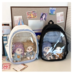Close-up of student backpack with transparent window for plush doll display