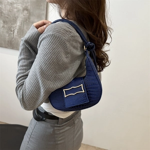 Navy blue crocodile pattern crescent shoulder bag with golden geometric buckle