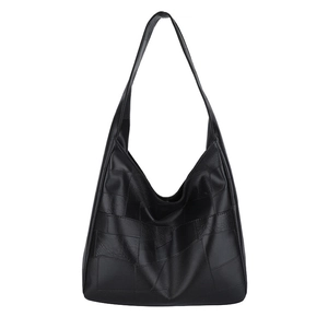 Minimalist large black geometric tote bag with wide strap for casual or commute use