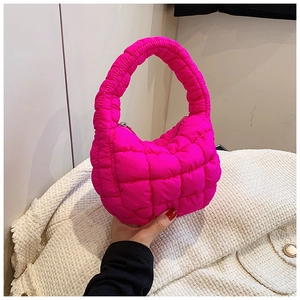 Detail of rose pink cloud handbag with quilted bubble fabric and smooth metal zipper