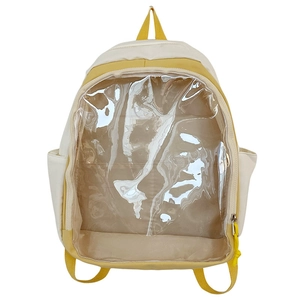 Detail of a beige and yellow backpack with a clear PVC front pocket for DIY display