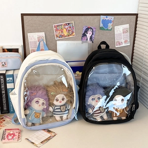 Detail showing two large capacity canvas backpacks with transparent PVC windows for plush toys
