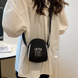 Mini black sporty crossbody bag for kids with white CHINA 01 lettering and shoulder strap