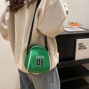 Mini green canvas sports crossbody bag with CHINA 01 lettering and adjustable strap