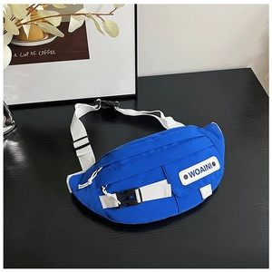 Detail of blue nylon waist bag with adjustable strap and WOAINI rubber logo patch