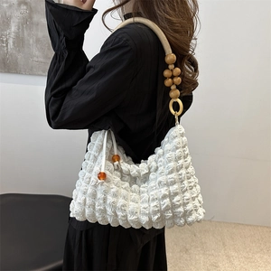 Chic white bubble pleat shoulder bag for women with wooden bead handle and textured fabric