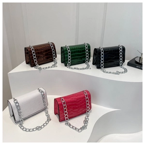 Assorted colors of crocodile pattern crossbody bags with chunky silver chains