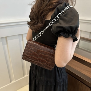 Retro dark brown crossbody bag with crocodile pattern and silver chain strap for women