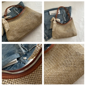 Detailed close-up of woven straw texture with brown leather handles and lace bow charm