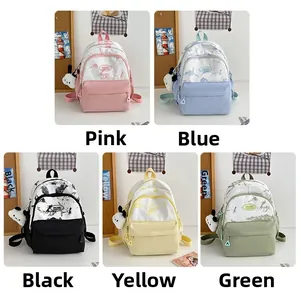 Detail view of large capacity nylon school backpacks in five colors with panda charms