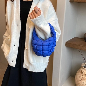 Bright blue pleated cloud handbag with large quilted patterns and wide handle for women
