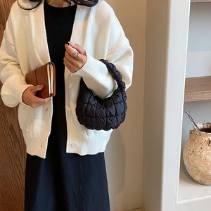 Minimalist black quilted cloud handbag with puffy texture for women in Korean style