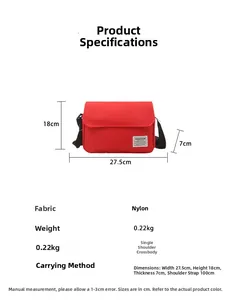 Detail view of red oxford fabric crossbody bag with dimensions and fashion label