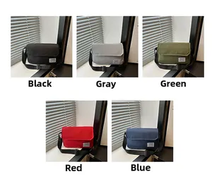 Oxford crossbody bag color options in black, grey, green, red and blue with fashion label