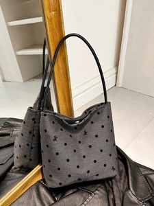 Chic grey canvas underarm bag with polka dots and bow print, retro minimalist style