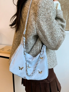 Light blue butterfly tote bag with silver chain strap for women casual commute fashion
