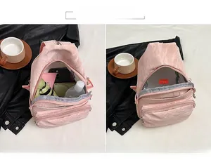 Pink quilted crossbody chest bag interior showing large capacity for phone and wallet