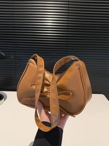 Borsa a mano minimalista marrone caramello con fiocco decorativo e tracolla larga moda