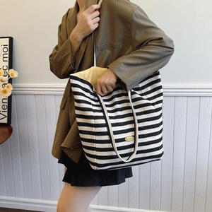 Classic large black and white striped canvas tote bag with woven rope handles