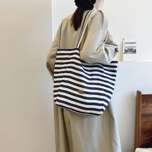 Blue and white striped canvas tote bag with leather patch, stylish large shoulder bag for women