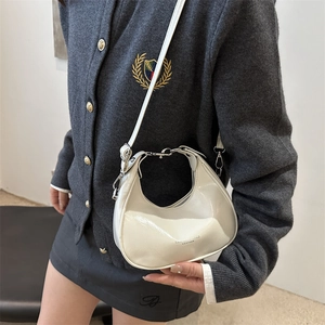 Glossy white crescent hobo bag for women with silver metal buckle and slim strap