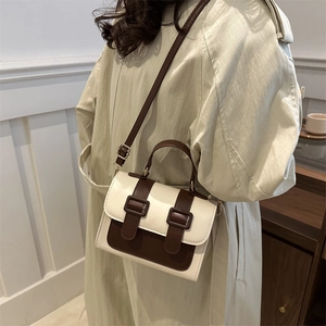 Vintage two-tone crossbody square bag in beige with dark brown straps and top handle