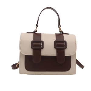 Fashionable beige and brown contrast crossbody bag with dual square buckles and top handle