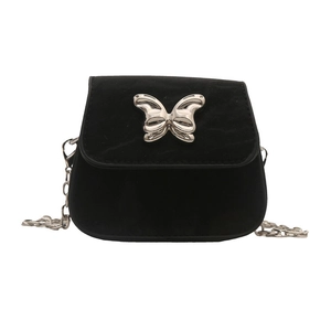 Mini sac à bandoulière noir avec boucle papillon argentée et finition en daim mat
