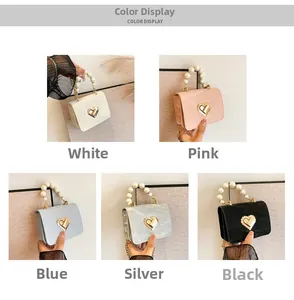 Detailed color display of mini pearl handle handbags with metallic heart clasp in five shades