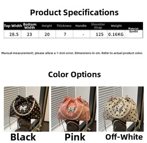 Polka dot drawstring bucket bag dimensions showing 28.5cm width and pearl handle detail