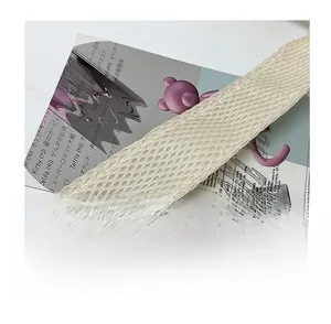 Detail of the breathable honeycomb mesh shoulder strap on this minimalist tote bag