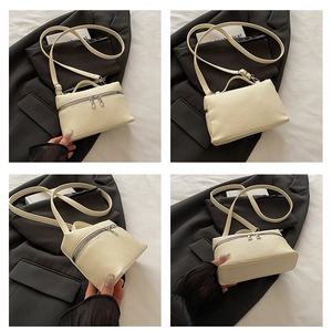 Multi-angle views of off-white lychee texture handbag with dual zipper closure