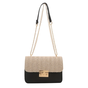 Chic woven straw and black leather crossbody bag with chain strap and gold buckle closure