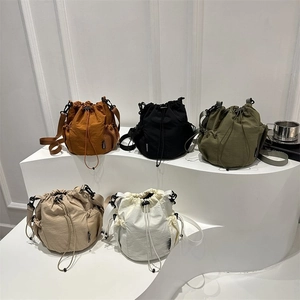 Nylon Drawstring Bucket Bag For Women Lightweight Crossbody Shoulder Bag Simple Casual Cell Phone Bag With Side Mesh Pockets