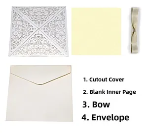 Elegant white laser-cut lace invitation card set with inner leaf, ribbon, and envelope