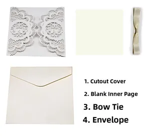 Detail showing laser-cut floral cover, inner page, ribbon and envelope set for wedding
