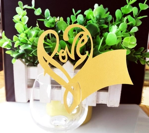Golden heart-shaped laser-cut place card with Love cutout for wedding glass decoration