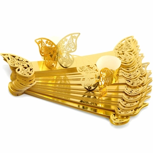 Golden laser-cut butterfly napkin rings with intricate镂空 wing patterns for table decor