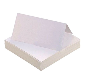 Detail of white tent-style folded place cards with a premium matte textured finish