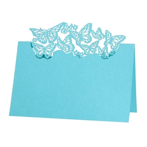 Laser cut sky blue table card with intricate butterfly hollow pattern for wedding seating