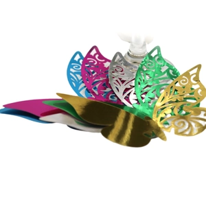 3D laser-cut butterfly place cards in metallic multi-color finish for wedding decor