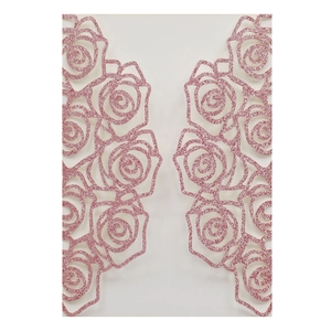 Detail of pink glitter laser-cut rose invitation cover with shimmering texture