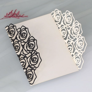 Elegant laser cut rose invitation card with black glitter and cream matte fold finish